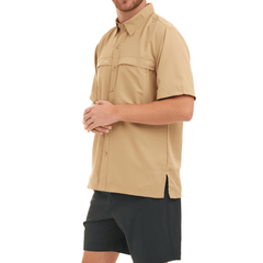 Man wearing khaki short-sleeve shirt and black shorts on a white background