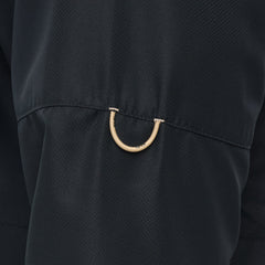 Man wearing Caviar black GameGuard Original long sleeve shirt with mesh vents, roll-up sleeves, GG logos, and a utility loop; built for sun protection and versatility.