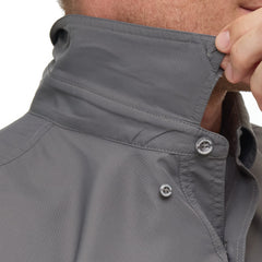 Man wearing GunMetal gray GameGuard Original short sleeve shirt with chest vents and GG logos; breathable, quick-dry performance for outdoor wear.